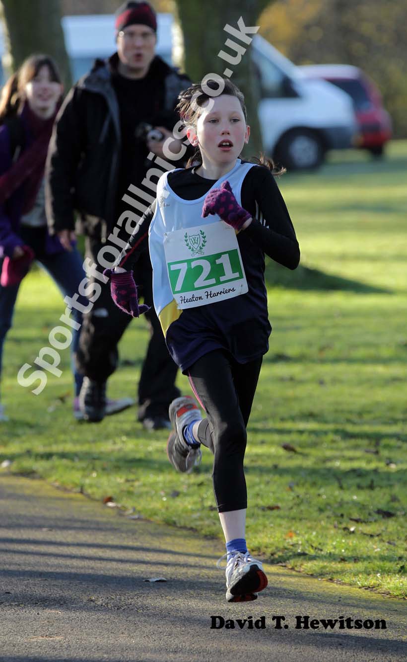 Natasha Stephenson  wins the under-11s Heaton Memorial Road Race.